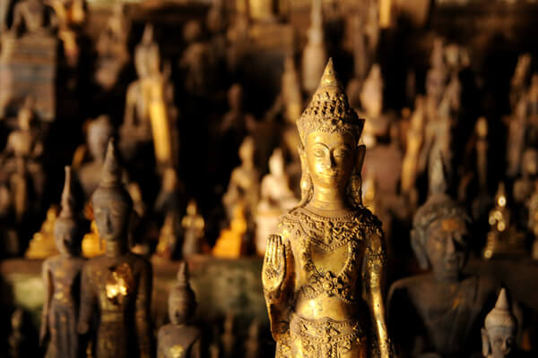 Buddha-images-in-Pak-Ou-Caves, visit laos 