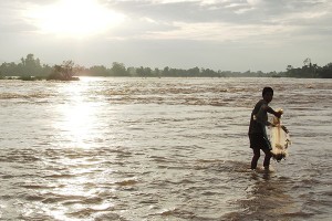 Laos fisherman catch fish in the Mekong river