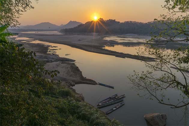 Mekong River bank in Laos honeymoon destination