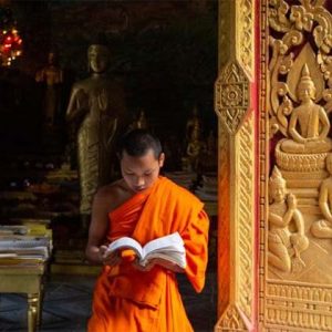 MekonMonk is reading Bhudda experience, Laos luxury tour packagesg Elephant Park Sanctuary