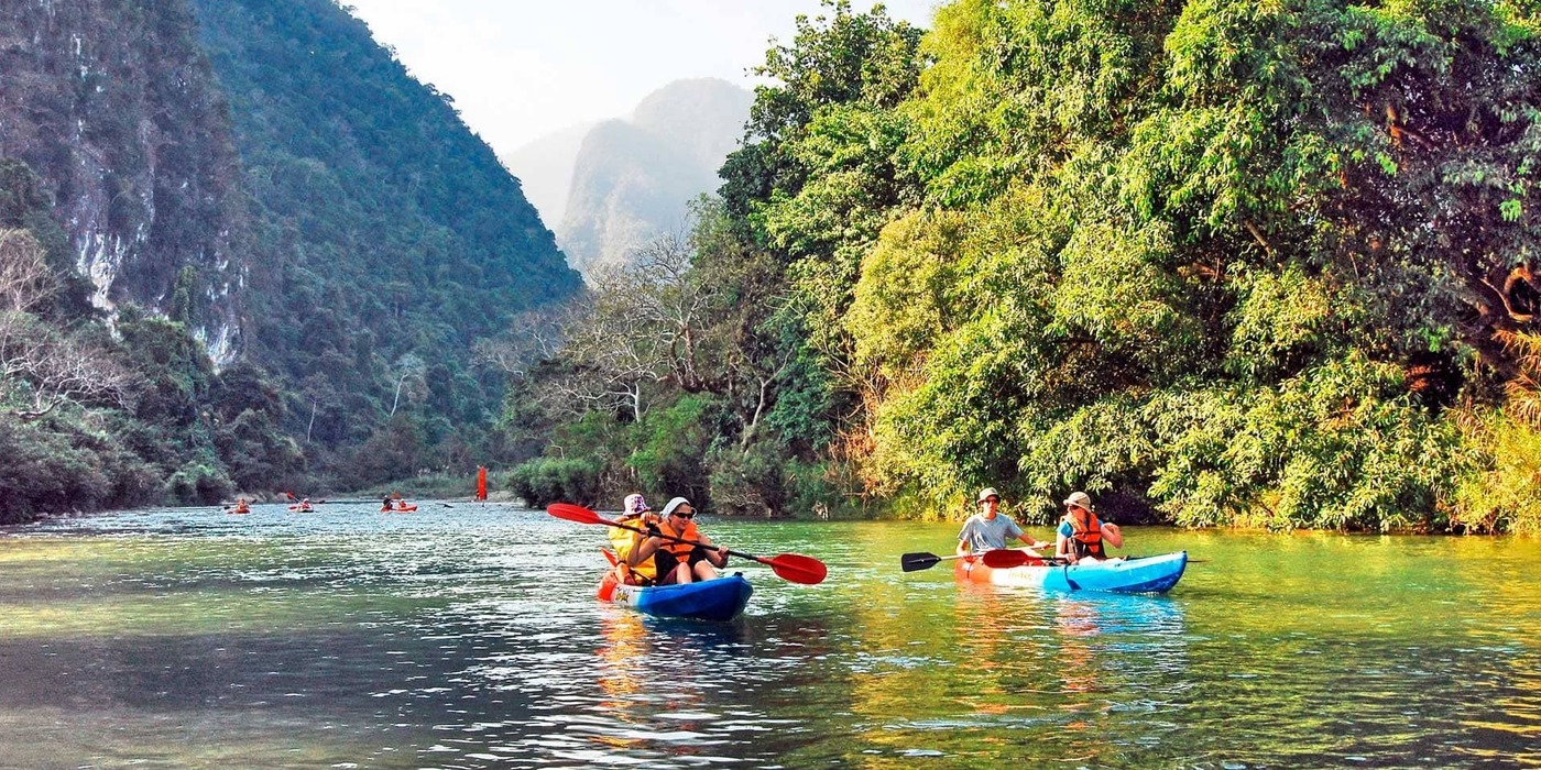 kayaking on river of laos travel packages